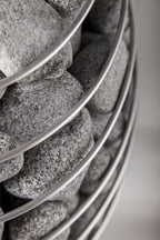 Close-up of the stone cage and sauna stones on the Huum Drop 9kW Sauna Heater