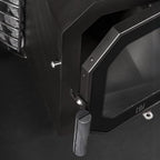 Close-up of the fire door handle on the Huum Hive Flow Mini LS 8.5kW wood-burning sauna stove