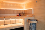 Harvia Cilindro PC110E 10.5kW Sauna Heater in a sauna with safety railing