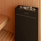 Harvia Virta HL110E 10.5kW Sauna Heater installed in a sauna with sauna stones