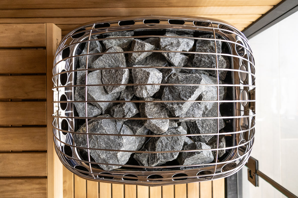 Top-down view of the Harvia Club K12.5G 12.5kW electric sauna heater stone-filled cage