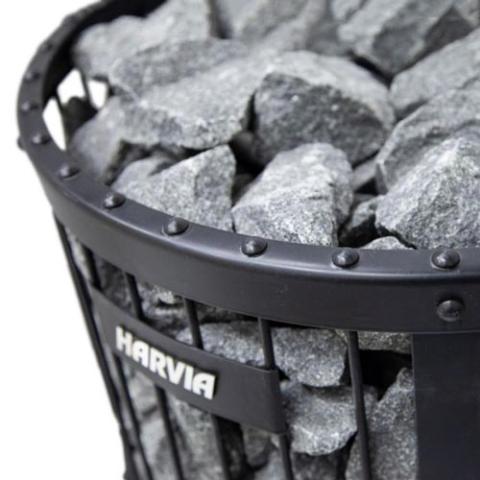 Close-up of the Harvia logo and sauna stones on the Harvia Legend 150 SL 16kW Wood-Burning Sauna Stove with Exterior Feed