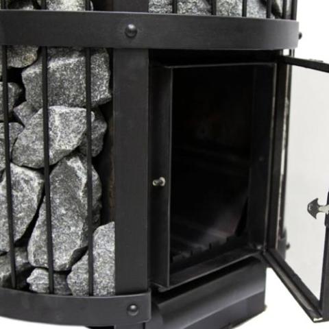 Close-up of the open door and stone-filled cage on the Harvia Legend 240 GreenFlame 15.9kW Wood-Burning Sauna Stove