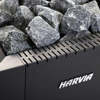 Close-up of the Harvia logo and sauna stones on the Harvia Linear 16 17.9kW Wood-Burning Sauna Stove