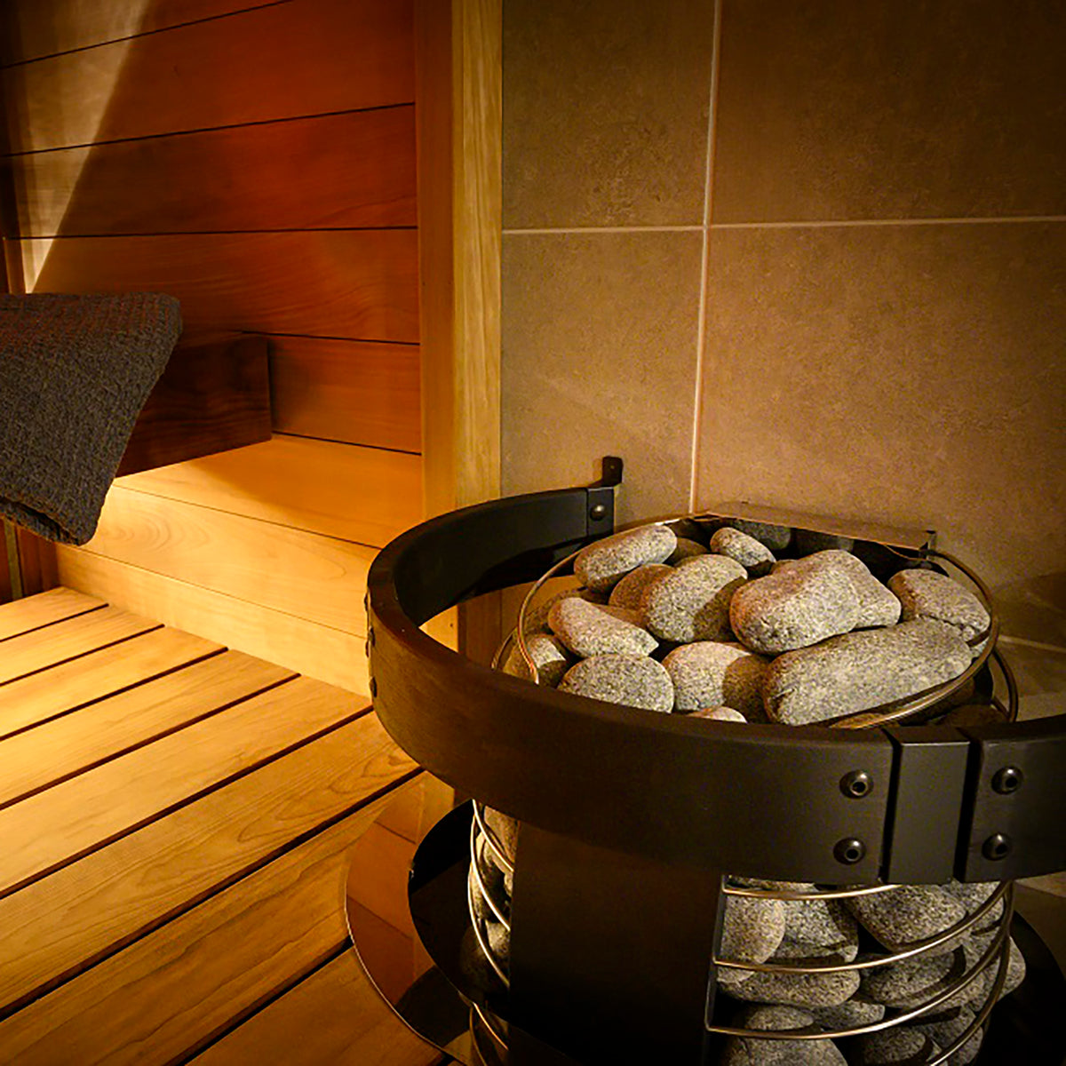 Top view of the Harvia Spirit 9kW Sauna Heater with sauna stones in a sauna
