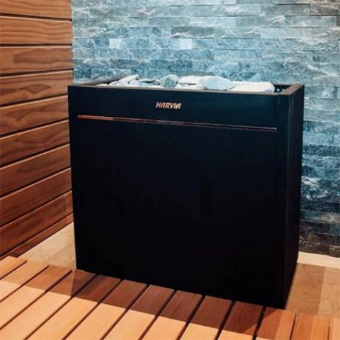 Harvia Virta Pro HL200E 20kW Sauna Heater in a sauna with wooden floor and wall