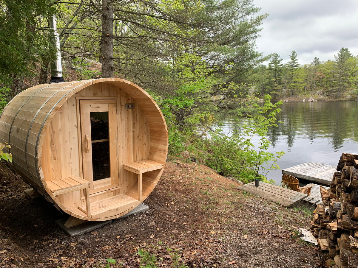 Dundalk CT Serenity 5-Person Outdoor Barrel Sauna on a lakeshore