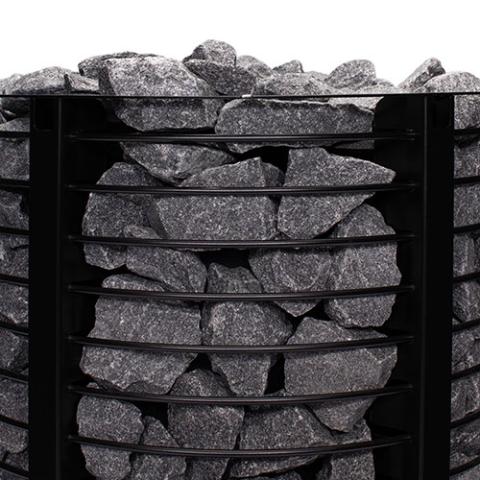 Close-up of sauna stones in the stone cage of the Narvi Inari 16kW wood burning sauna stove