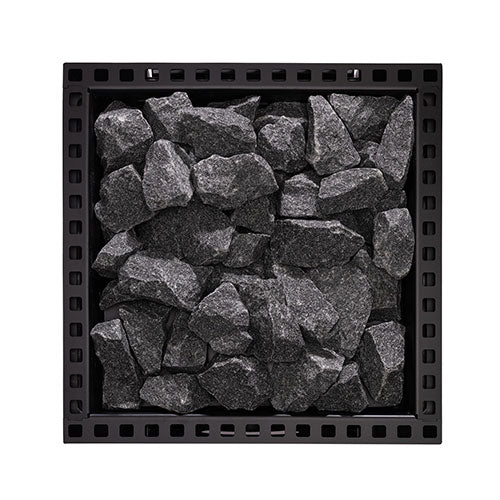 Top view of the stone compartment filled with sauna stones on the Narvi Kuru 14 13kW wood burning sauna stove