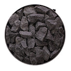 Top view of the round stone compartment filled with sauna stones on the Narvi Luosto 16kW wood burning sauna stove
