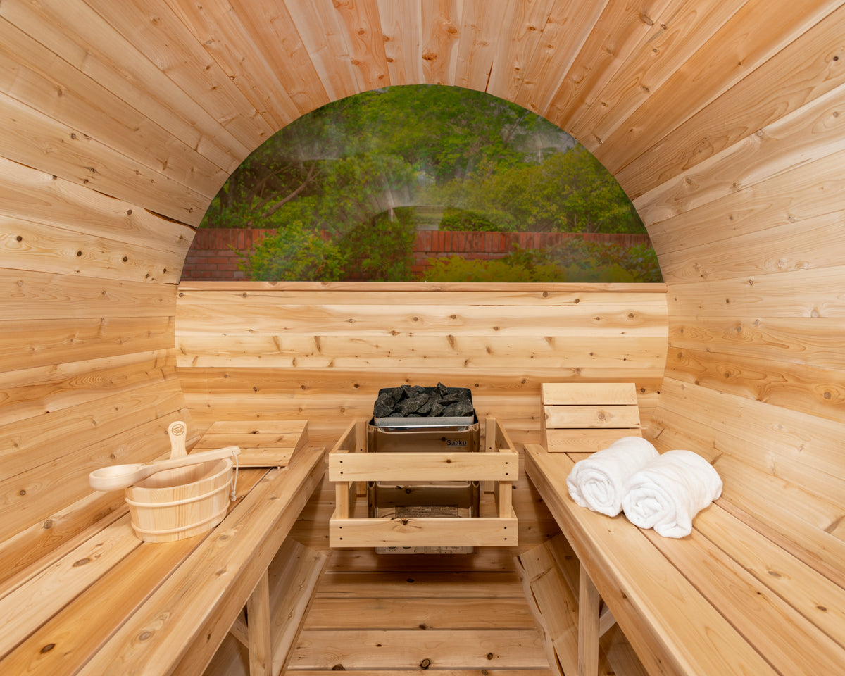 Interior of the Dundalk CT 6-Person Outdoor Barrel Sauna with Half-Moon Windows with benches and half-moon window