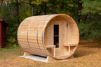 Dundalk CT Serenity 5-Person Outdoor Barrel Sauna in a wooded clearing