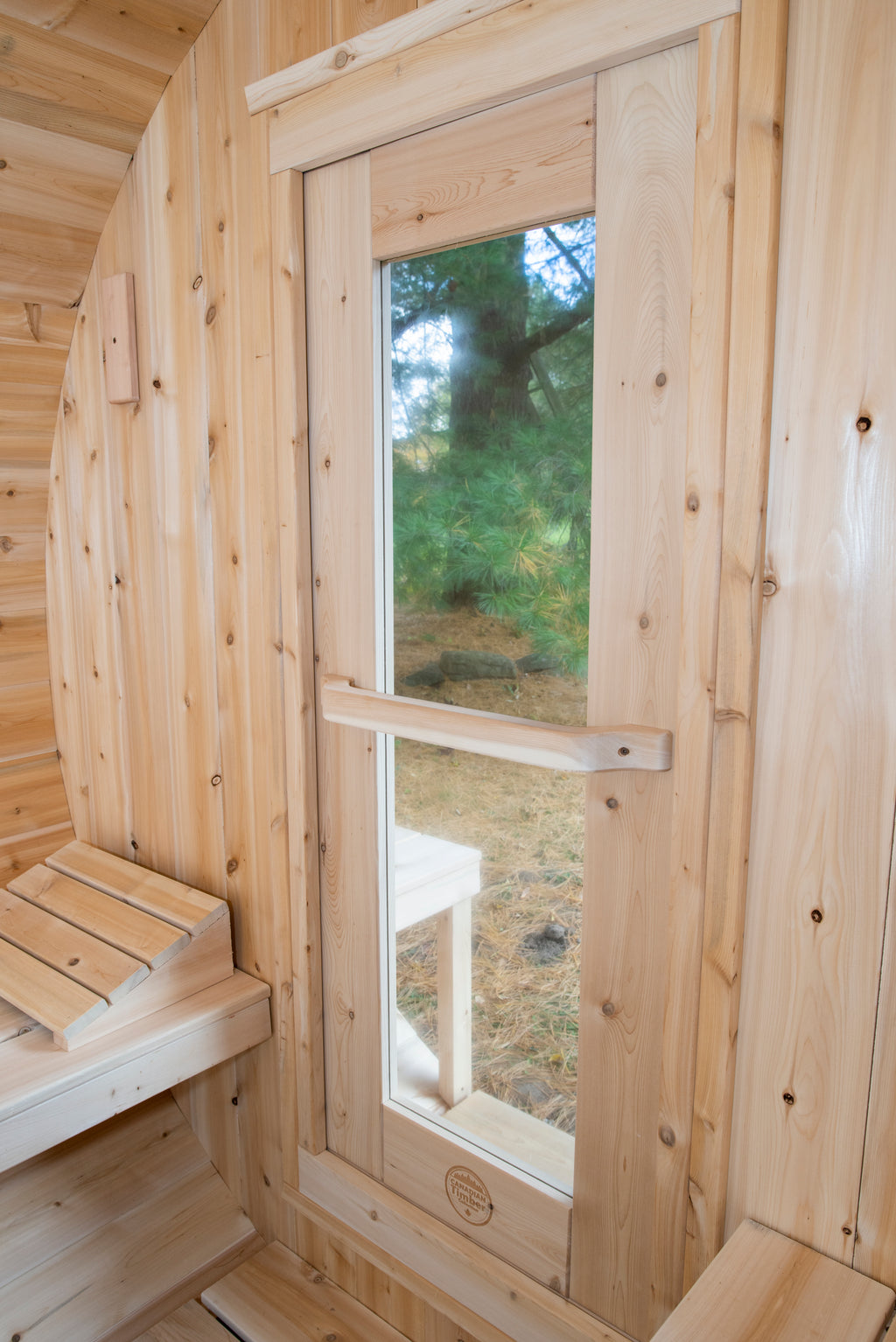 Glass door inside the Dundalk CT Serenity 5-Person Outdoor Barrel Sauna