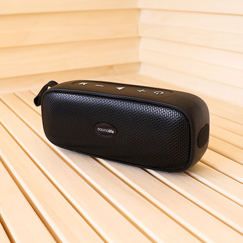SaunaLife Verse Bluetooth speaker on a light wooden sauna bench