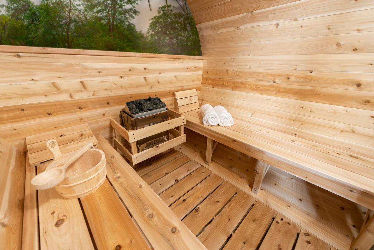 Heater and benches inside the Dundalk CT Serenity 5-Person Outdoor Barrel Sauna with Half-Moon Windows