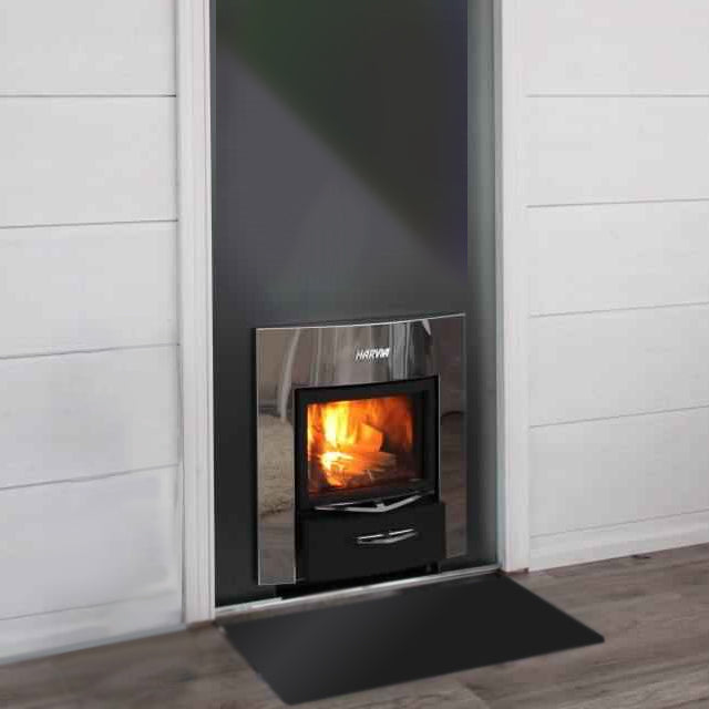 Harvia Pro 20 Duo 24kW Wood-Burning Sauna Stove and Fireplace installed through a wall, fireplace side facing the room