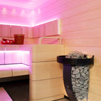 Harvia Spirit 9kW Sauna Heater in a sauna with pink LED lighting