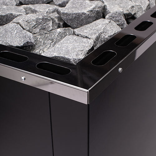 Close-up of the stainless steel top edge and sauna stones on the Narvi 30 24kW wood burning sauna stove