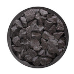 Top view of the round stone compartment filled with sauna stones on the Narvi Inari Plus 16kW wood burning sauna stove