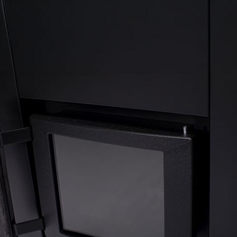 Close-up of the glass door on the Narvi Kaamos 20 21kW wood burning sauna stove