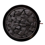 Top view of the round stone compartment filled with sauna stones on the Narvi Luosto VS 16kW wood burning sauna stove