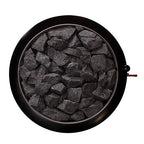 Top view of the round stone compartment filled with sauna stones on the Narvi Luosto VS 16kW wood burning sauna stove