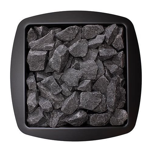 Top view of the stone compartment filled with sauna stones on the Narvi NC 24 17kW wood fired sauna heater