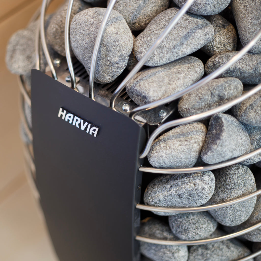 Close-up of the Harvia logo and sauna stones on the Harvia Spirit 9kW Sauna Heater