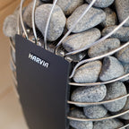 Close-up of the Harvia logo and sauna stones on the Harvia Spirit 8kW Sauna Heater