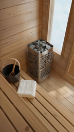 Interior of the Dundalk CT Palmer 4-Person Outdoor Cabin Sauna with heater, bucket and window